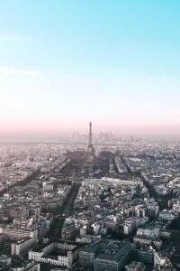 Explore Paris's iconic skyline with an aerial view of the Eiffel Tower.