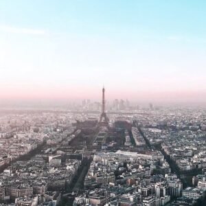 Explore Paris's iconic skyline with an aerial view of the Eiffel Tower.